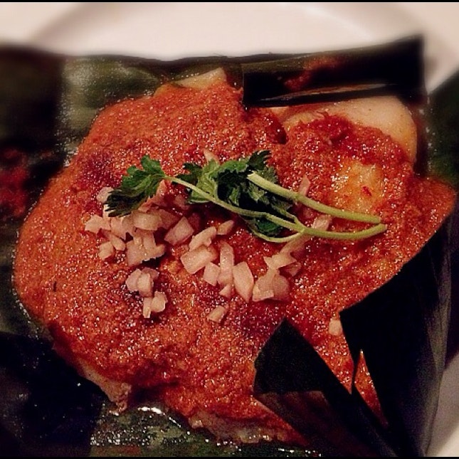Snapper fillet wrapped in a banana leaf w red curry paste, coconut milk n ginger