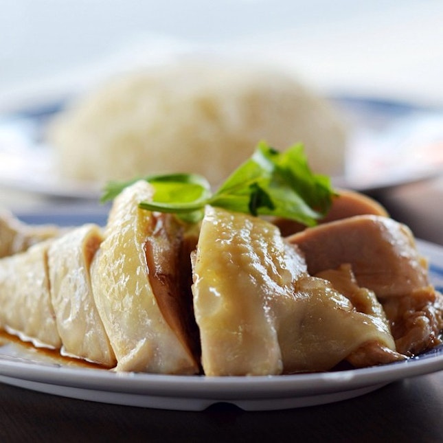 Do you consider Hainanese chicken rice a uniquely Singapore hawker dish?