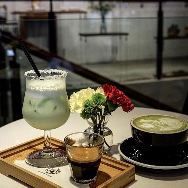 This cafe serves unique creations of coffee such as this Ondeh X Latte (the drink on the left).