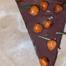 Dark Chocolate Tart with Hazelnuts and Rosemary ($14) 