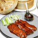 Crispy Skin Roasted Duck marinated with Dried Mandarin Peel, accompanied by Chinese Pancake, Cucumber and Spring Onions