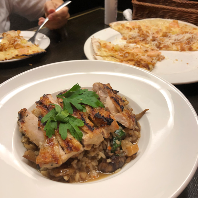 Grilled chicken and mushroom risotto $25++, Garlic snowing pizza $26++