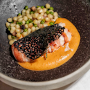 Tarragon Butter Poached with Maine Lobster served with Petti Pois and Ginger Crustacean Espuma