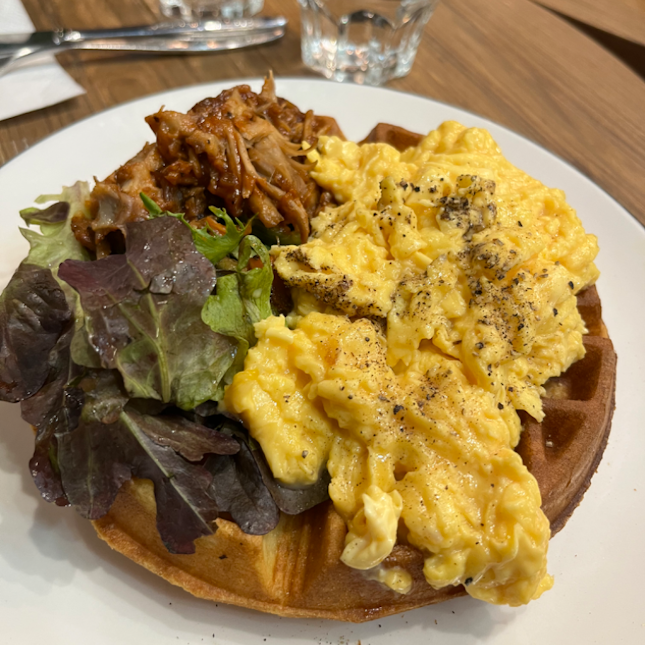 Pulled pork waffles with scrambled eggs