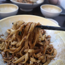 Chewy noodles, peppery sauce