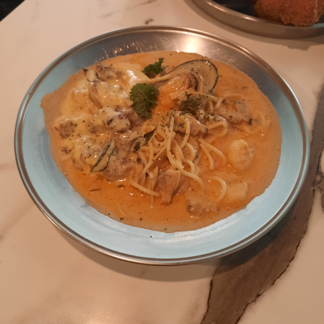 Tom Yum Salted Egg Pasta with Chicken Cutlet