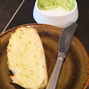 Semolina bread w alpine butter topped w herbs