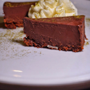 Chocolate tart with green tea and Chantilly cream