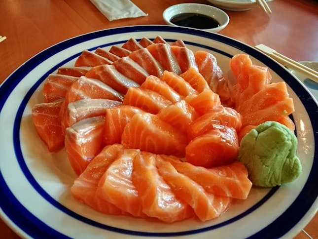 Taking full advantage of the promotion and having our fill of sashimi.