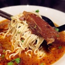 Lamian with beef brisket in chili oil soup.