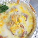 Ahhhh just look at all that creamy #baked #cheese with corn slathered over the sliced steak and rice!