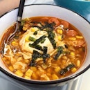 남자라면 (Man Ramyeon) with Hotdogs and Corn, an unintentionally poached egg toped with korean seaweed.
