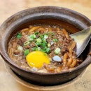 [Claypot pearl noodle] - served sizzling hot in the claypot, when mixed together with the egg, the taste is so damn good!