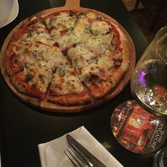 A well spent night over Hawaiian Stone Oven Pizza ($20 - which was ok only) and a glass of wine.