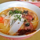 Cooked in a rustic aluminum pot over charcoal - my favorite laksa in town for only $2!