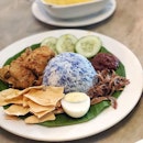 They served nasi lemak in peranakan style where the fragrant coconut rice is in blue.