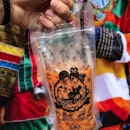 Soaking in the celebratory atmosphere with a bag of Cha Yen ($3) during the Thai Festival 2018 at the Royal Thai Embassy.