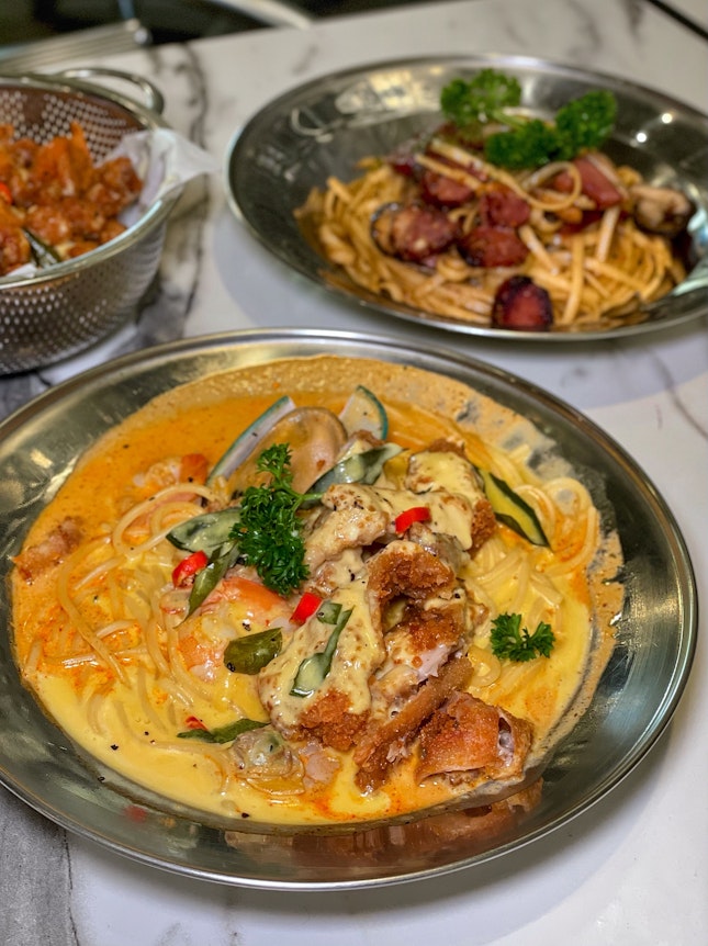 Tom Yum Salted Egg Seafood Pasta with Chicken Cutlet ($16.90)