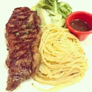 Steak & Pasta Combi [$9.90 - student lunch promo] The aglio olio was great but the ribeye steak was a bit too hard for the medium well request.