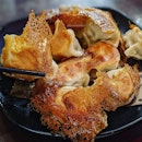 Pan fried dumpling ($6.50/ 10 pcs)