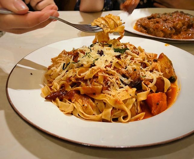 [Ranting post] Huge hanging menu, bright lights, about 20 seater, self-service, pastas were all under $20.