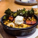 Baked eggs with bell peppers, tomato, chickpeas, goats feta & Turkish bread with chorizo