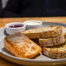 Multigrain toast with jam & cultured butter & pan-fried king salmon