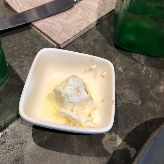 Marinated Goat Cheese ($7)
