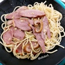 This Smoked Duck Aglio Olio from Fish & Chicks tastes just like it looks: plain.
