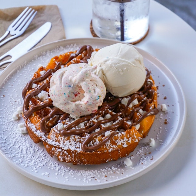 For 1-for-1 Half Waffle + Single Scoop (save ~$7.50)