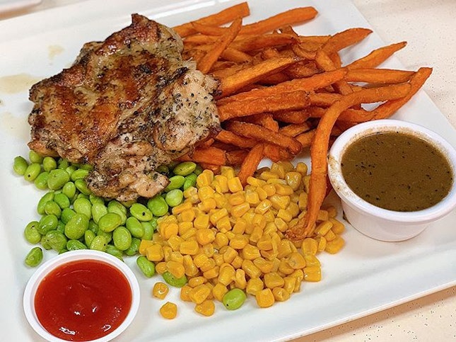 Signature Chicken Chop ($9.50) Served with sweet potato fries, edamame and sweet corn.