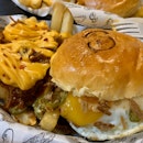 Single Cheese Burger + Sunny Side Up Egg + Cuban Fries Upgrade | $6 + $1 + $3