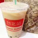 6.02pm yesterday: after shopping, buying two dresses, and getting myself perfumed with oily fried food smell sipping [Honey Oolong Milk Tea with Pearls S$2.80]