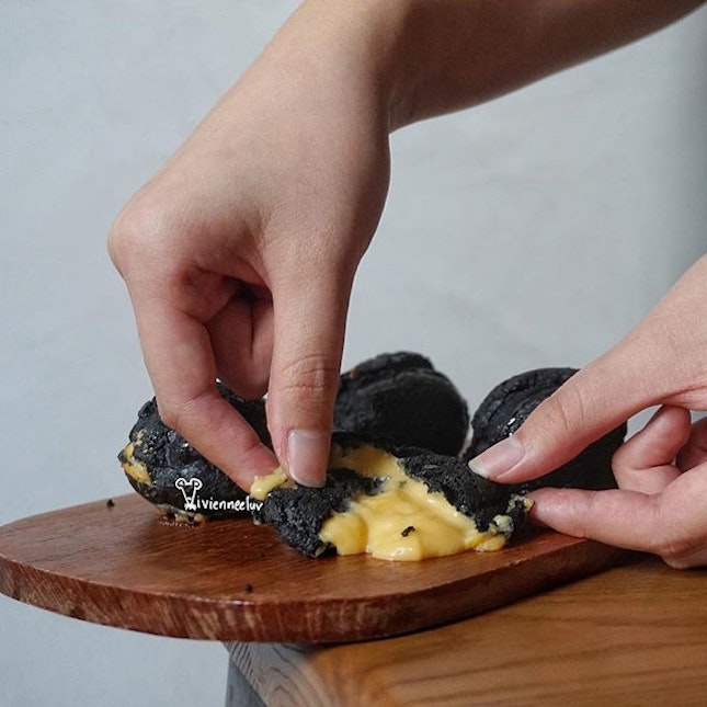 [Salted Egg Charcoal Choux S$5] - sweet charcoal choux combined with oozy salted egg filling😍.