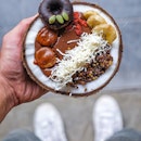 Getting some daily dose of happiness with this healthy & delicious Chocolate Acai Bowl served in a coconut at @vibeasia .