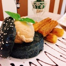 Cottage special: Charcoal burger with latte macchiato ice cream and a side of churros ($9.80).