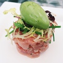 Tuna from OSIA – unstained, compressed watermelon, yuzu emulsion, frozen basil.