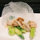 Stir-fried coral clam with asparagus in “Lao Gan Tie” sauce.