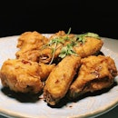 Almost thinking about the "Not A Cock Up" AFC (Asian Fried Chicken) Wings - pinnacle vodka infused crispy wings - I had less than a hundred minutes ago at Black Nut, a newly-opened buah keluak-inspired bar on Emerald Hill.