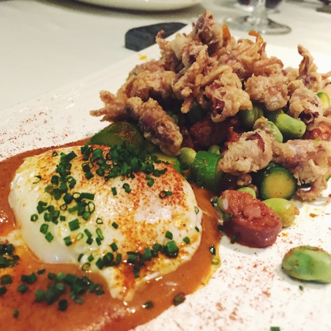 Fried Baby Calamari, served with Soft Egg, Chorizo and Fava Beans ($26)