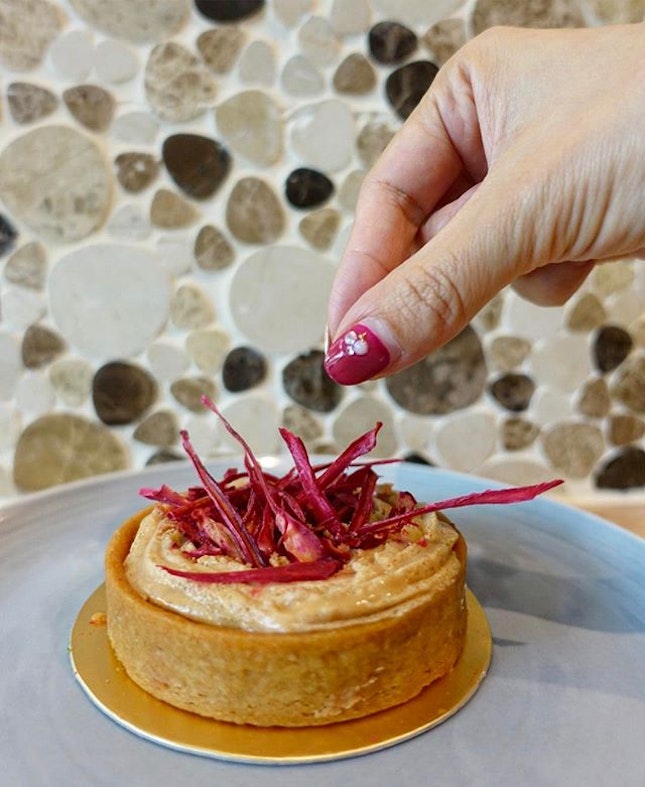 Revel in the Rojak Banana Tart @thegaragesbg

For those wondering how is rojak part of the tart itself, the pinkish red strips on top are actually made from rojak flowers.
