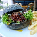 Revel in the Beef Rendang Charcoal Burger @rockymaster_sg 
The charcoal bun will surely capture your attention first but once you sink your teeth in the beef rendang, you will be enticed by the fork-tender minced meat with a strong coconut milk aroma and flavourful spice paste.