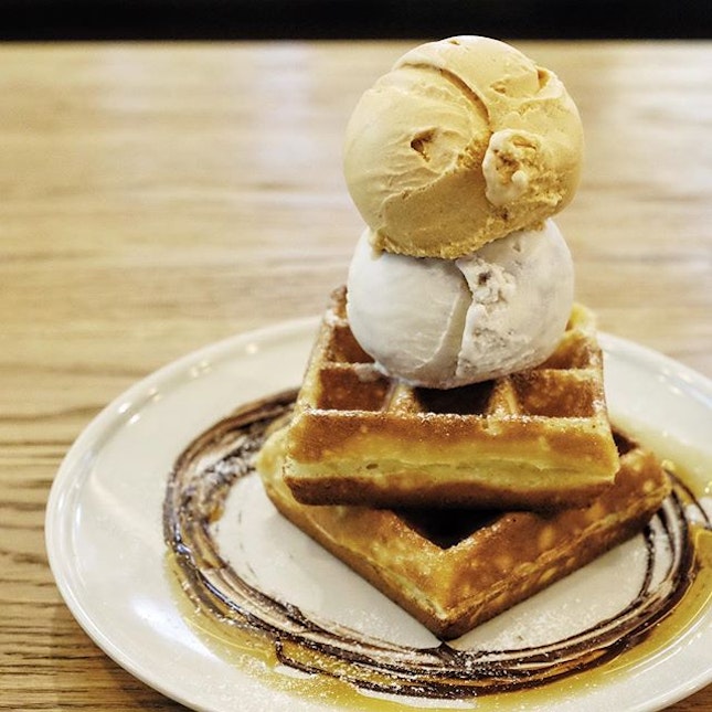 Peanut butter and jelly ice cream and Thai milk tea ice cream atop two excellent, crispy waffles.