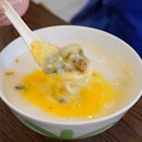 Century Egg & Minced Meat Congee With Egg ($4.80)
