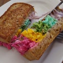 Enjoyed ourselves at @Epicurious_sg with their new rainbow cheese toast which uses real food for the colouring ^^!