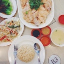 Enjoying a typical Singaporean lunch...Hainanese Chicken Rice with the holy trinity 'chili-ginger-black' sauces.