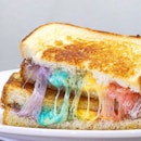 Rainbow Cheese Toastie ($9)
Truffled grilled cheese naturally coloured with vegetables purée of beetroot (pink), carrot (orange), spinach (green), cauliflower/blue pea flower (blue) & red cabbage (violet).