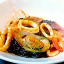 Squid Ink Taglierini With Mixed Seafood In Tomato Sauce ($20)