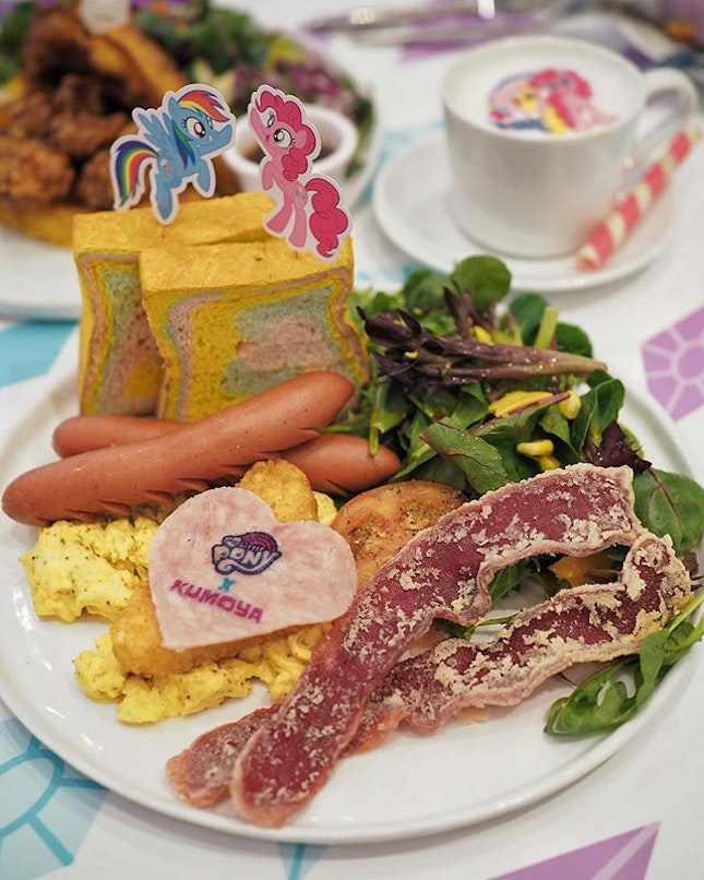 Magic Friendship Rainbow Big Breakfast ($24.90) A breakfast designed by Rainbow Dash and Pinkie Pie just for you - toasted house-made rainbow bread, chicken and beef sausages, crispy turkey bacon, chicken ham, grilled tomato, scrambled eggs, hashbrown, fresh garden salad, with cute cheese Stars.