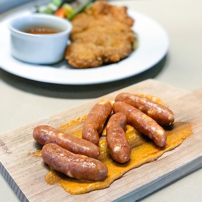 Chicken cheese arabiki sausages [$9++] Served with smears of sambal mayo, these relatively short and slender smoked chicken sausages are filled with cheesy surprise.